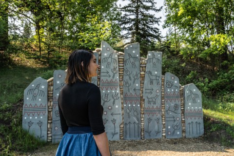 I Want To Start 16 Indigenous Art Park A girl stands in front of a sculpture at the park